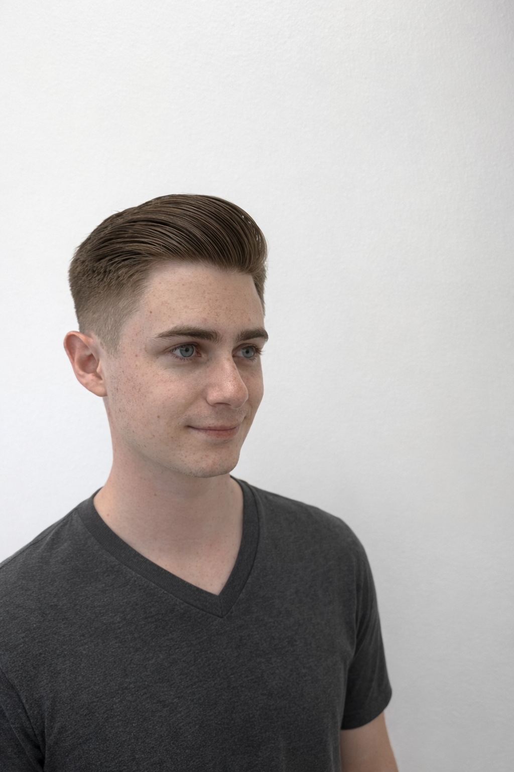 Men's sidepart haircut by Trevor at Modern Rebel Barbershop in Los Angeles