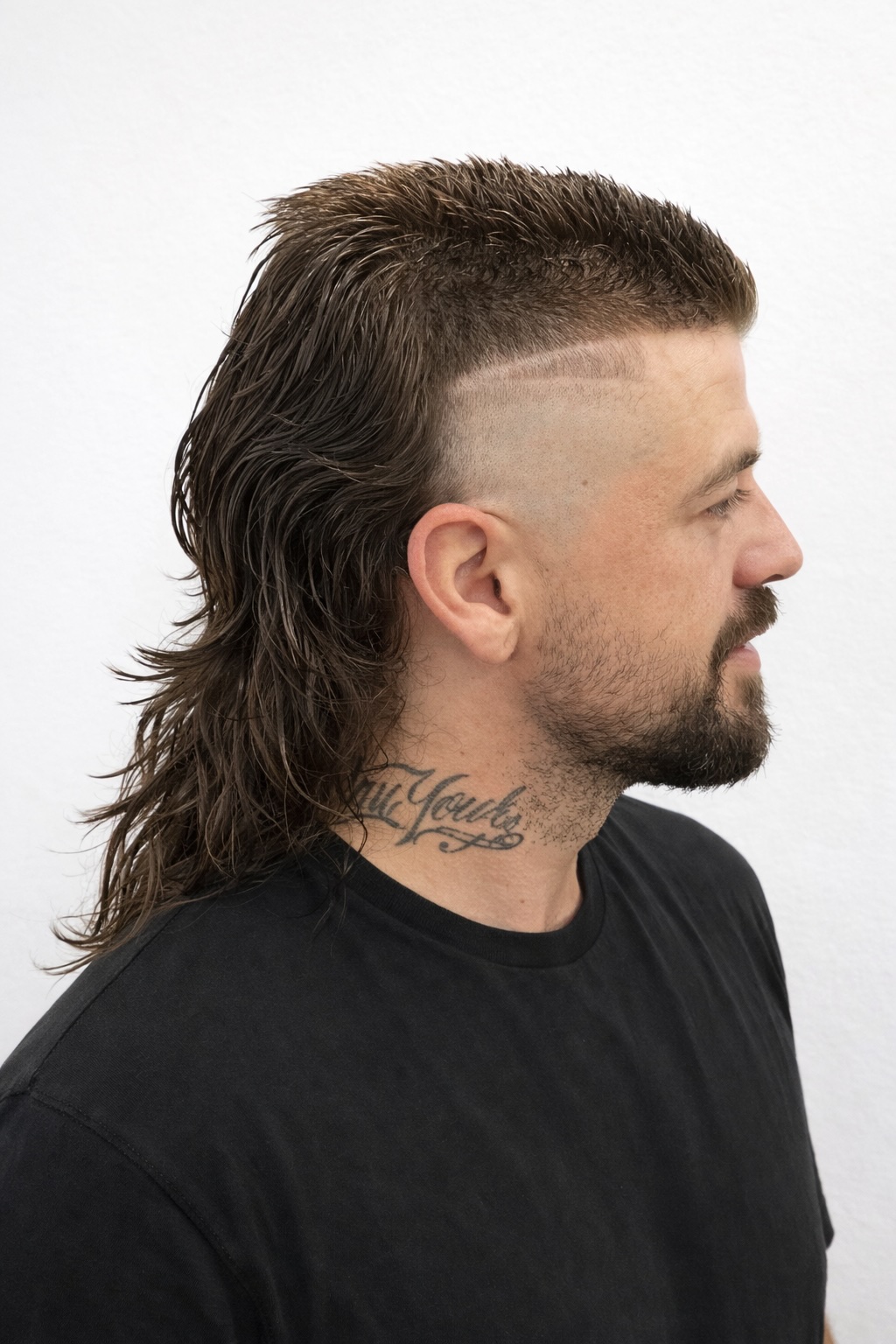 Mullet haircut & design by Trevor at Modern Rebel Barbershop on Fountain and Vine